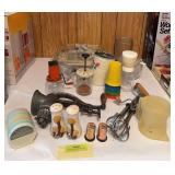 Vintage kitchen items includes grinders, S&P shakers, Tupperware, sifters, etc