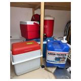 Various size coolers, water thermos and an Aquatainer