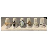Six rings, various size and style