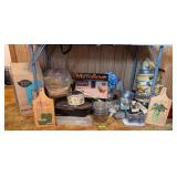 Kitchen items includes pots & pans, 35c percolator, paper plate trays, lasagna pan and much more