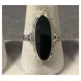 Size 8 ring marked STERLING