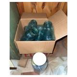Box of blue Ball jars and zinc lids