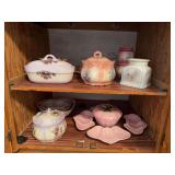 Pink and purple ceramics, most done by Seller