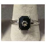Size 8 ring marked STERLING