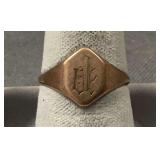 Size 7.75 monogram ring marked 10K Band has been cut