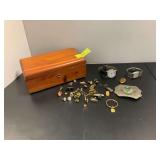 Lane jewelry box w men’s jewelry includes Timex watch, Lorus watch, belt buckle, cuff links, tie tacks, key ring w FMC marked 10K and green stones, etc