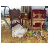Spoon rack and spoons, tablecloth (has blemishes), cardinal plate, storage ottoman, sewing machine decor, etc