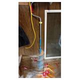 Ice auger and 4 ice pro ice fishing jigs