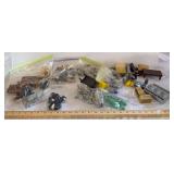 Two plastic containers of farm animals, implements, and accessories as shown