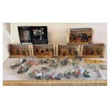 Two plastic containers of cowboys and Indians 6 nib sets