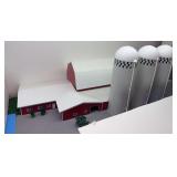 Masonite barn with lean tos, 3 plastic silos