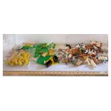 Two plastic containers of farm animals, implements, and accessories as shown
