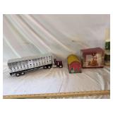 Assorted plastic building pieces tin lithograph building livestock semi tractor trailer and some enchanted Forest figurines