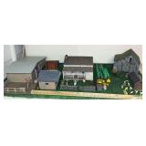 Wood and resin buildings and figures as shown