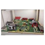 Vintage plastic and handmade wood farm buildings, figures and implements layout is approx 4 x 4