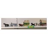 3 Metal hitch wagons, covered wagon w/4up hitch vintage, covered wagon w/2 up hitch old and newer spring seat wagon w/2 mule hitch