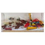 Two plastic containers of farm animals, implements, and accessories as shown