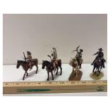 4 cast metal mounted cowboys and Indians