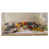 3 plastic containers of farm animals, implements, and accessories as shown