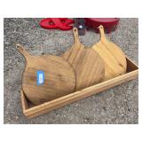 Three pizza boards, and wooden box