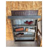 Wooden rustic display shelf with gathering room sign, and additional decor and signs