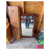 Mirror off of a vintage dresser and three wooden shelves