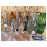 17 vintage bottles