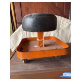 Vintage industrial heavy metal shop stool on casters