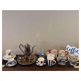 Silverplate coffee service, ceramic tea pots, cups etc...