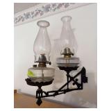 Double lamp cast iron wall bracket and 2 kerosene lamps