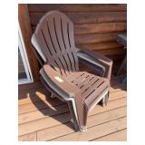 Three plastic Adirondack style porch chairs