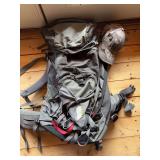 Large REI frame pack and camo hats