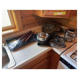 Some cooking pans, fondue pot, grill tools