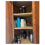 Cupboard full of drinking glasses