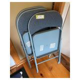 Three folding chairs