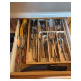 Drawer full of heavy duty gourmet settings, flatware