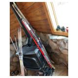 Solomon skis and poles plus men’s boots size 11
