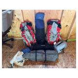 The ultimate couples adventure set up! Includes two matching frame packs with water bladders two sleeping bags and one tent