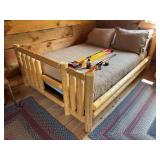 ￼ Queen sized log bed