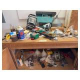 Inside and on bench includes circular saw, halogen work light, hardware, funnels, etc