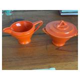Harlequin covered sugar and creamer Creamer appears to have glaze defect from factory on handle