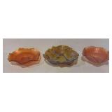 Three pieces marigold carnival glass