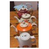 Five tea kettles