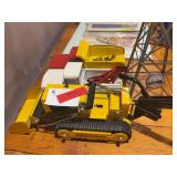 3 Tonka vehicles and toy windmill