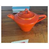 Harlequin tea pot, very small flea bites in glaze, most likely from factory