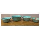 Set of four nested Homer Laughlin stoneware mixing bowls