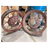 Pair of 21” steel automobile wheels, one w Ford hubcap