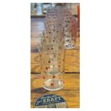 18 Kraft Swanky Swigs glasses and one lid, stars & curly “q” pattern