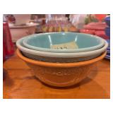 Three Homer Laughlin stoneware mixing bowls (2) 9” and (1) 8”