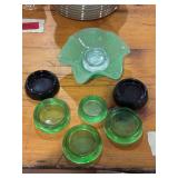 Ruffled edge green glass dish, two purple glass furniture rests and four green